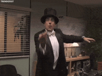 A GIF of Steve Carrell doing magic